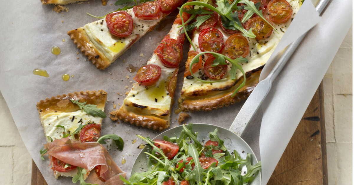 La délicieuse tarte aux tomates cerises et roquette qui va égayer vos repas